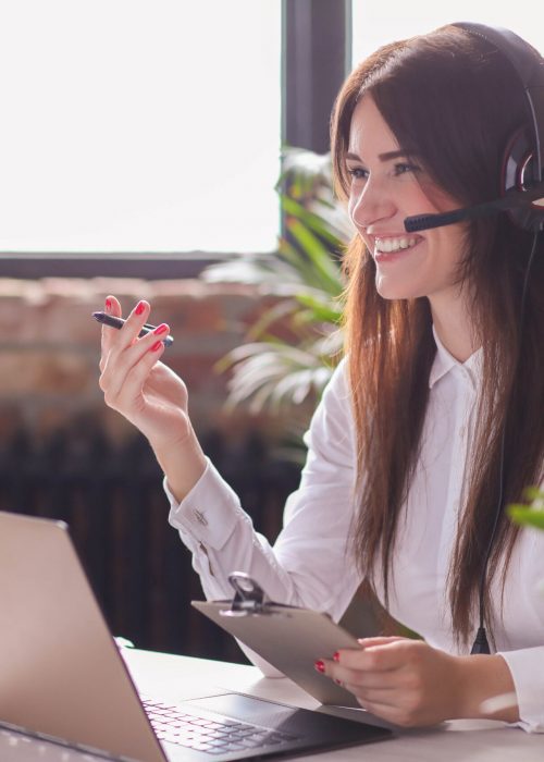 Woman working in call center as dispatcher